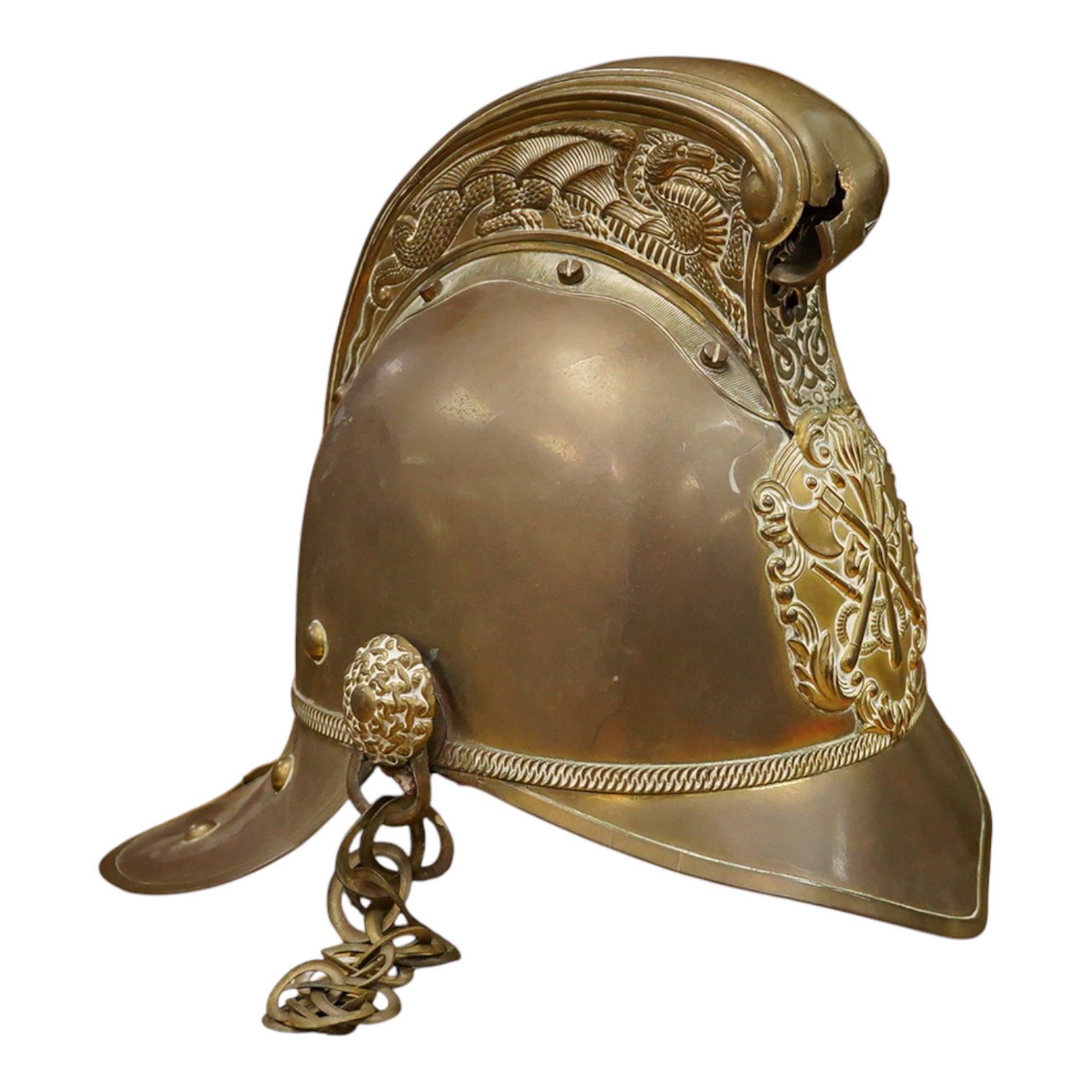 A 20th century theatrical British Metropolitan brass fireman’s helmet, 21cm high